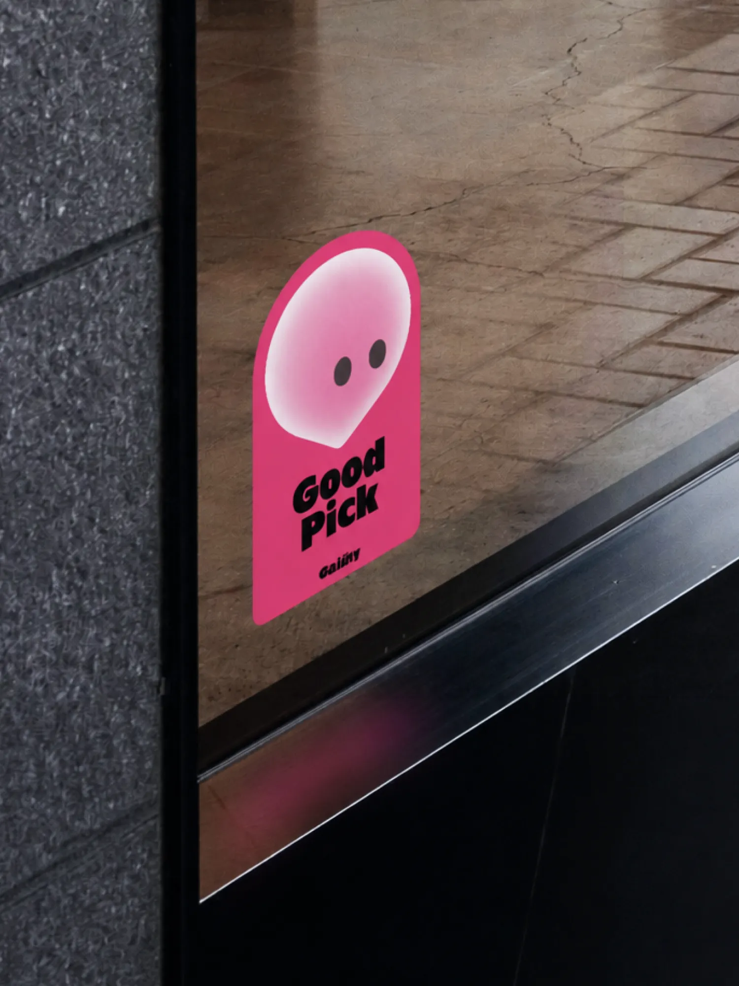 Gaidly location-pin sticker on a window.