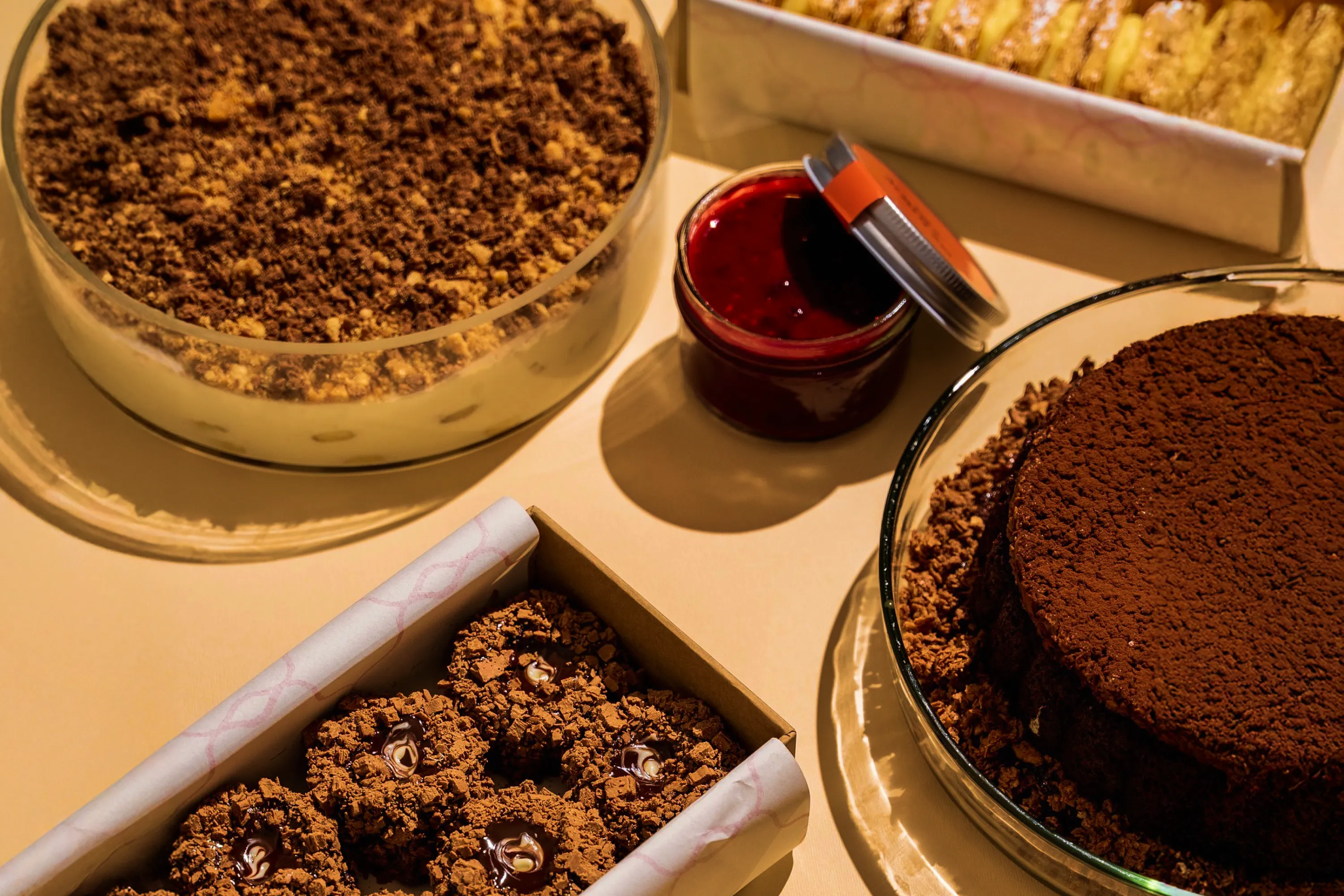 Kokoy chocolate desserts and cream presented in packaging.