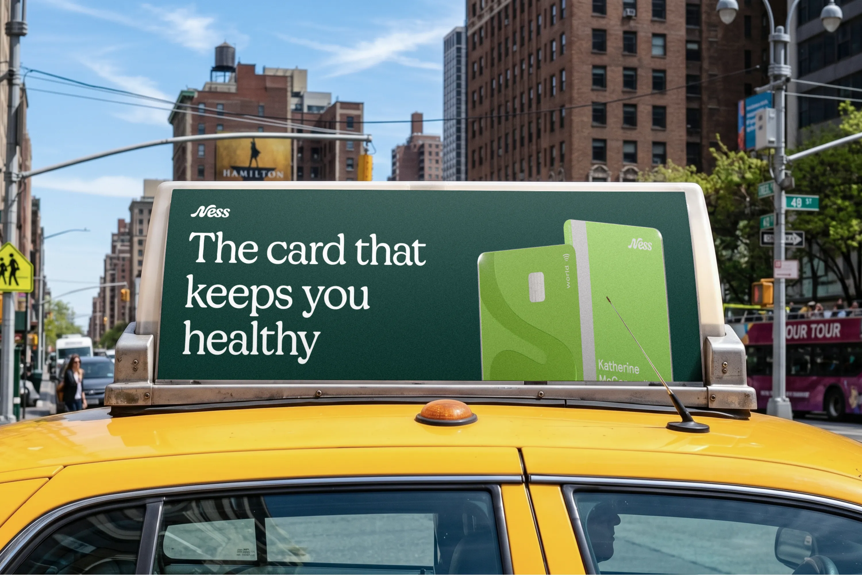 Ness taxi advertisement with a green card and “The card that keeps you healthy”.