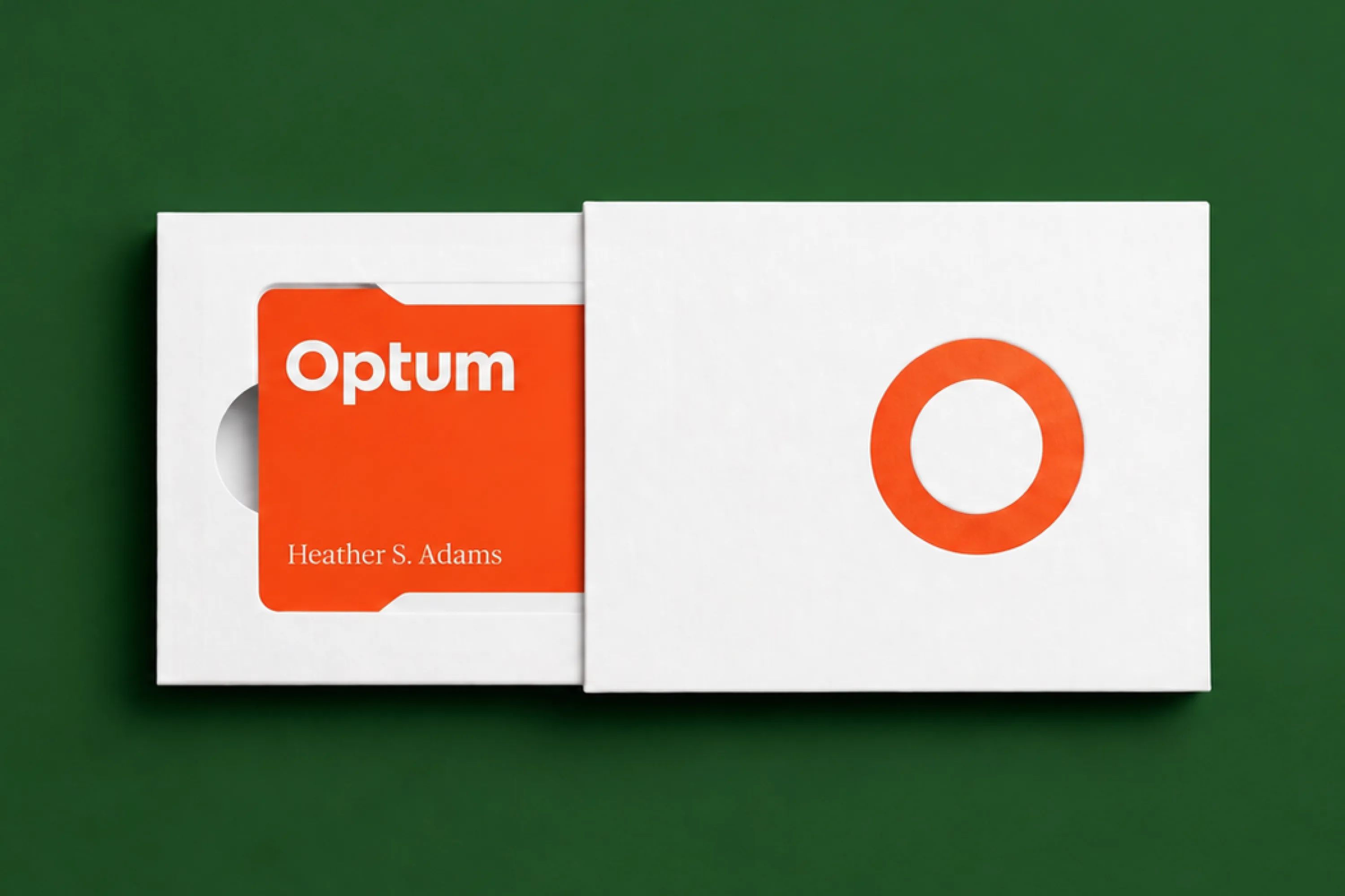 Optum card welcome packaging with the orange circle motif.