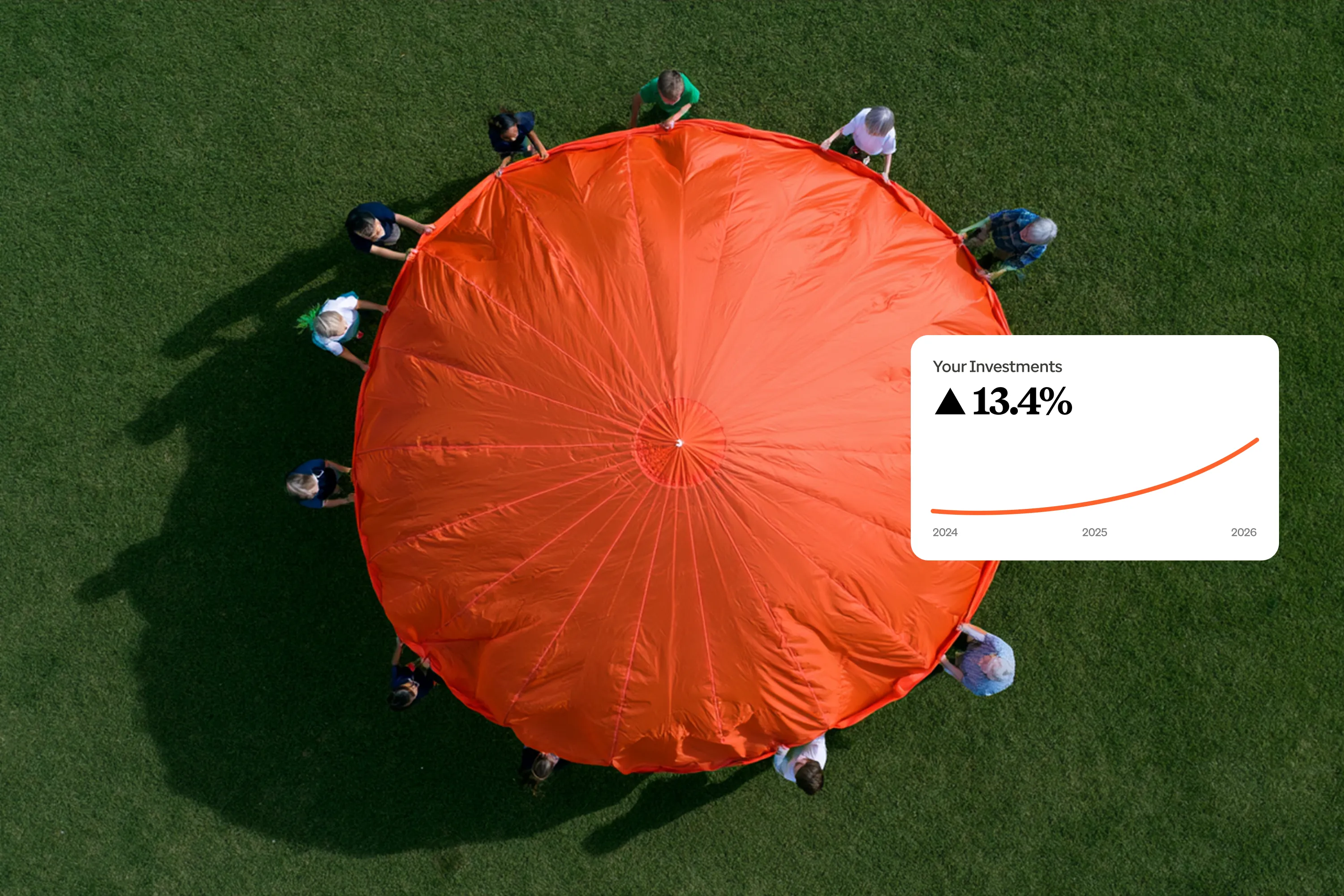 Overhead gathering around an orange table with an investment growth graphic.
